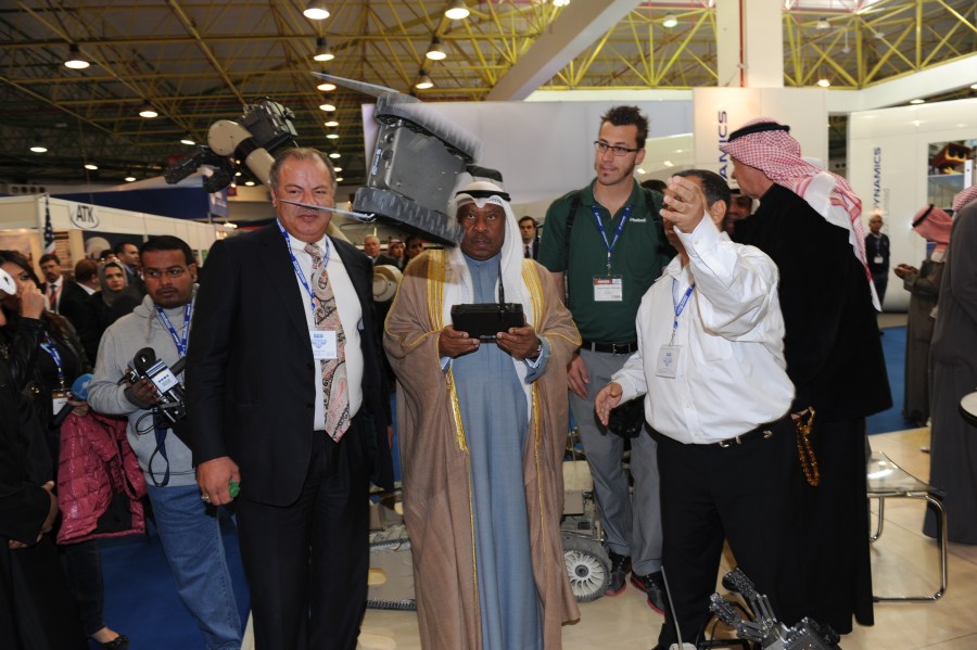 The Sheikh Checks out a Throwbot tossed by David Tashji, Director FMS